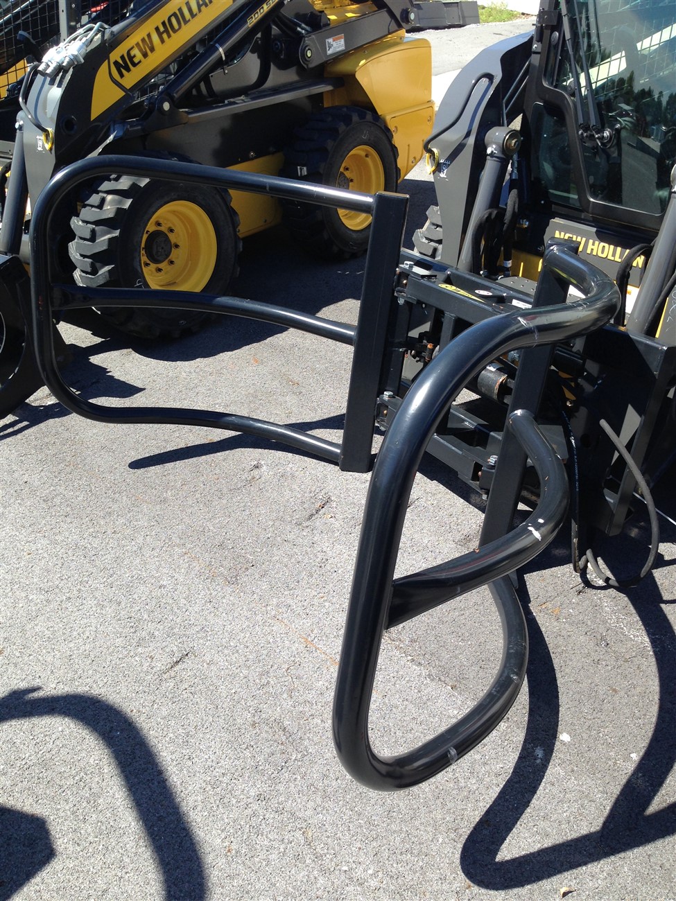 WIFO ROUND BALE GRABBERS, SKID STEER MOUNT